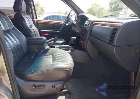 1999 Jeep Grand Cherokee Limited from USA, damaged, VIN 1J4GW68S9XC666797